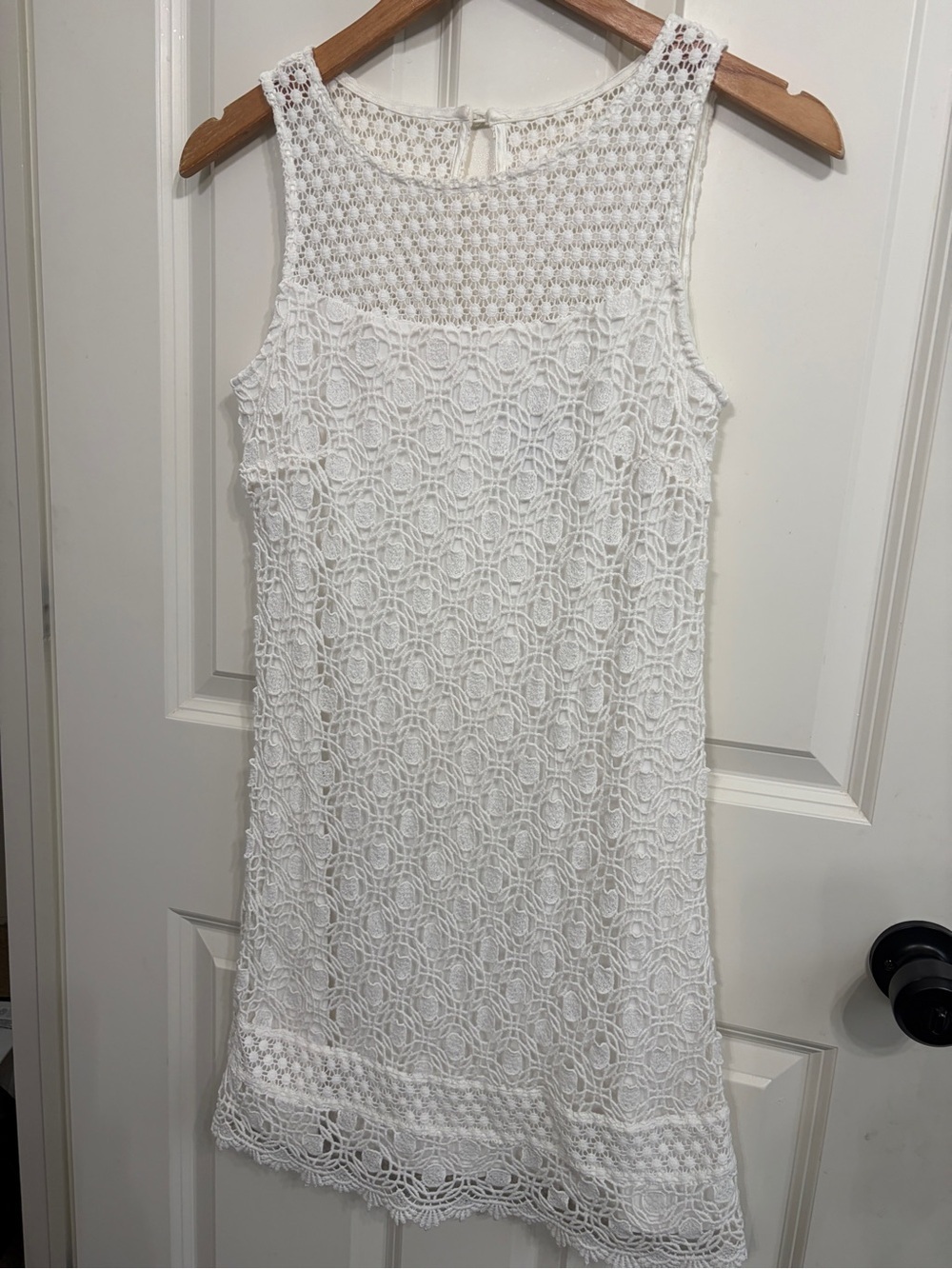 Like new White House Black Market sleeveless shift dress in white crochet lace. - Picture 2 of 8